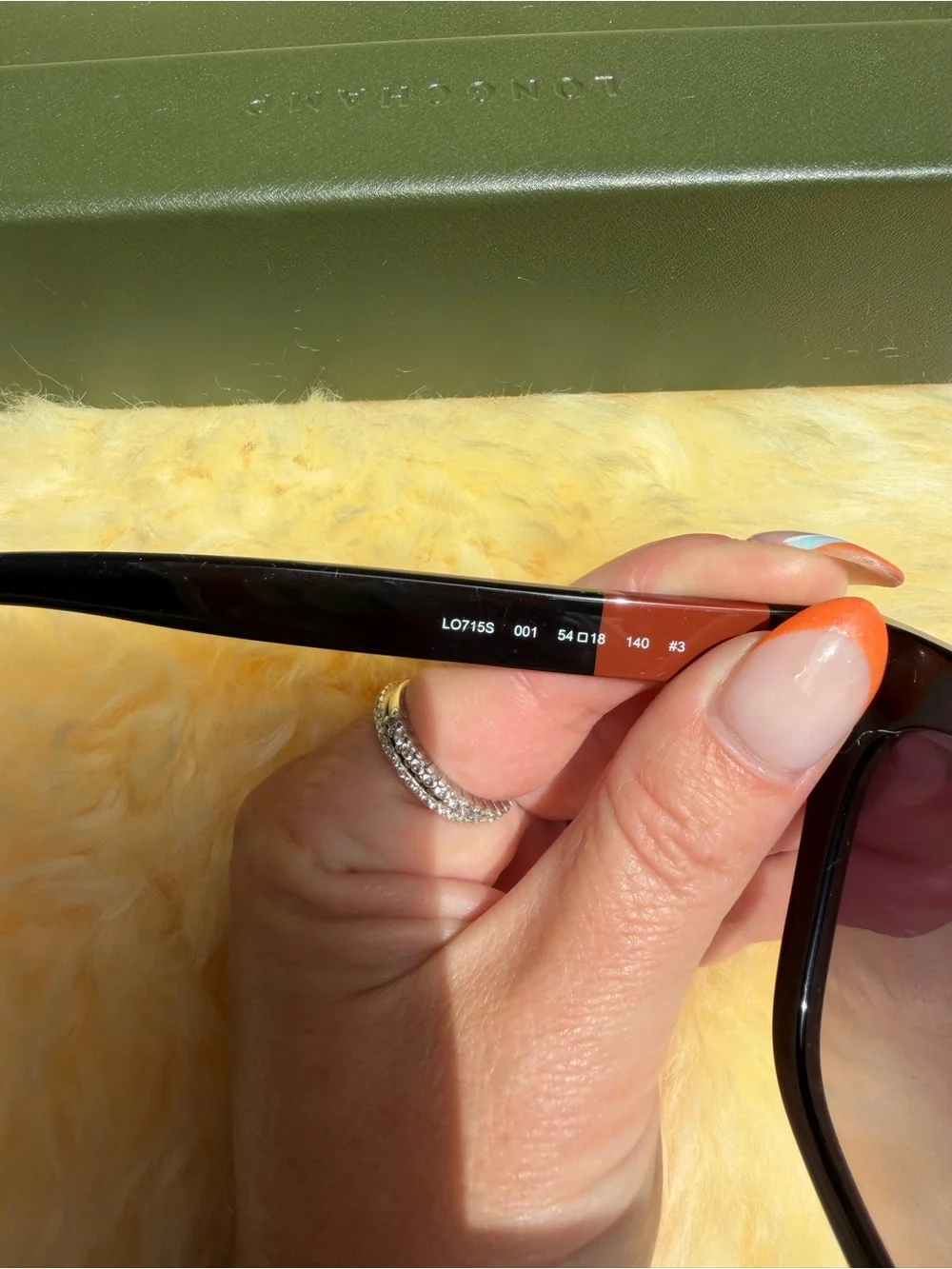 Longchamp Black Cat-Eye Sunglasses with Brown Gradient Lenses